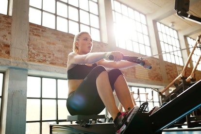 To row properly, make sure you're set up on the rowing machine in the correct position.