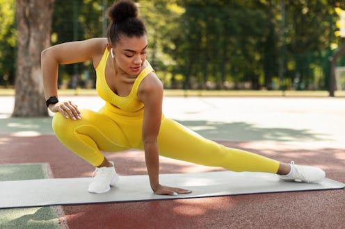 Take a wide step to the side to stretch your legs before a pickleball game.
