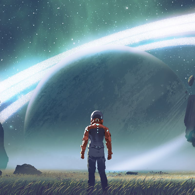 Sci-fi scene showing futuristic man standing in a field looking at the planet with giant rings, digi...