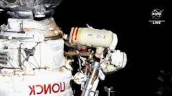 This image provided by NASA, Italian astronaut Samantha Cristoforetti and Russian cosmonaut Oleg Art...