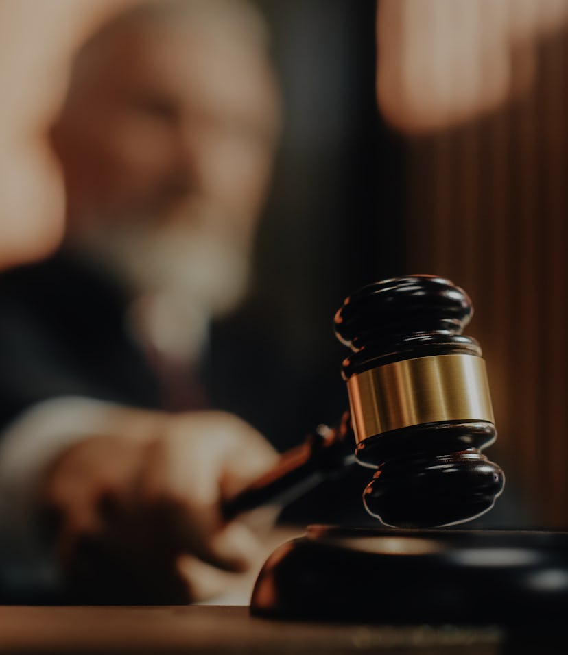 Court of Law and Justice Trial Session: Imparcial Honorable Judge Pronouncing Sentence, striking Gav...