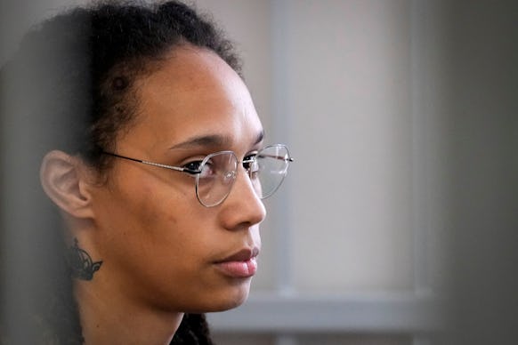 Star and two-time Olympic gold medalist Brittney Griner sits in a cage at a court room prior to a he...