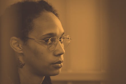 Star and two-time Olympic gold medalist Brittney Griner sits in a cage at a court room prior to a he...