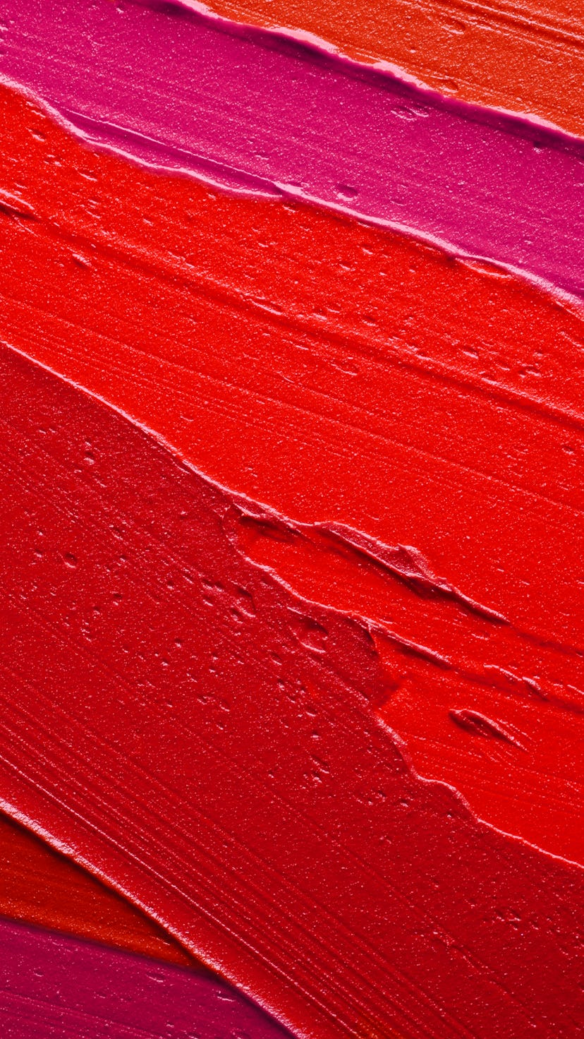 Lip gloss pink red smudge background