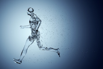 Human body shape of a running man filled with blue water on blue gradient background - sport or fitn...