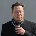 Elon Musk, Tesla CEO, is on the premises of Tesla Gigafactory at a press meeting. On the same day, C...