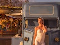 bride in a white wedding suit, background Wonderground, street food truck, carousel;