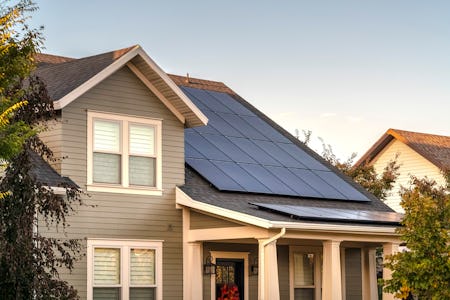 Solar photovoltaic panels on a house roof