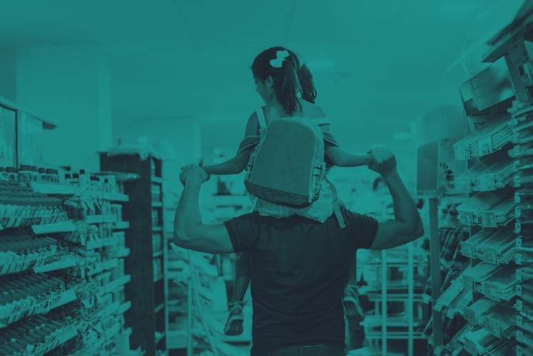 Father and daughter buying school supplies preparing to go back to school, preparing for september, ...