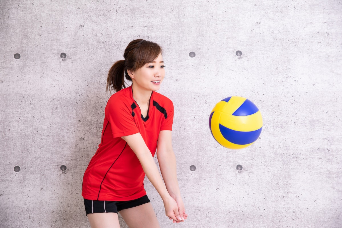 You need strong legs to jump high, a strong core for balance, and strong arms to strike the volleyba...