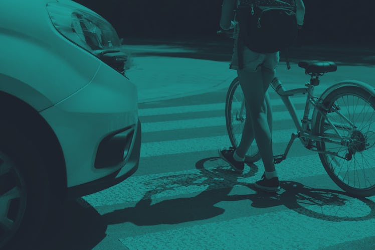 Teenager school girl with backpack and bike walk in pedestrian crossing in front of a car