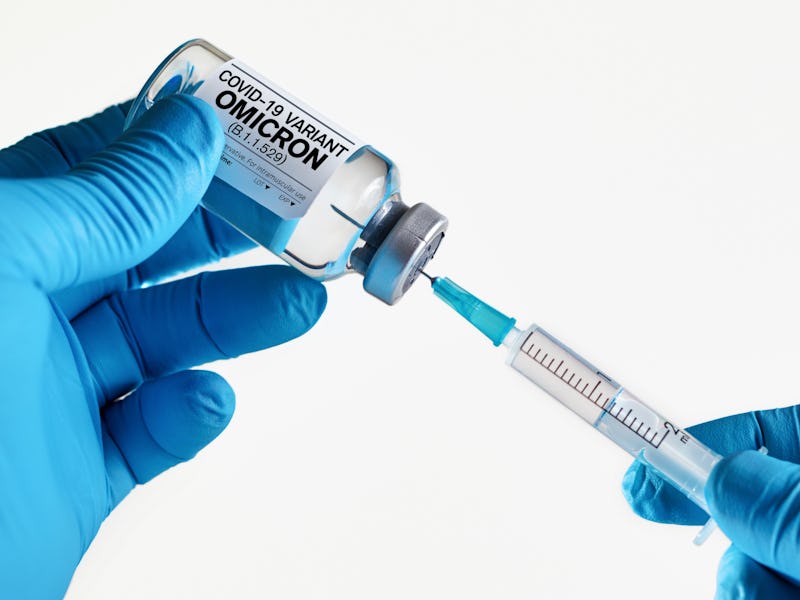 vaccination for booster shot for Coronavirus Omicron in the population. Doctor with syringe and vial...