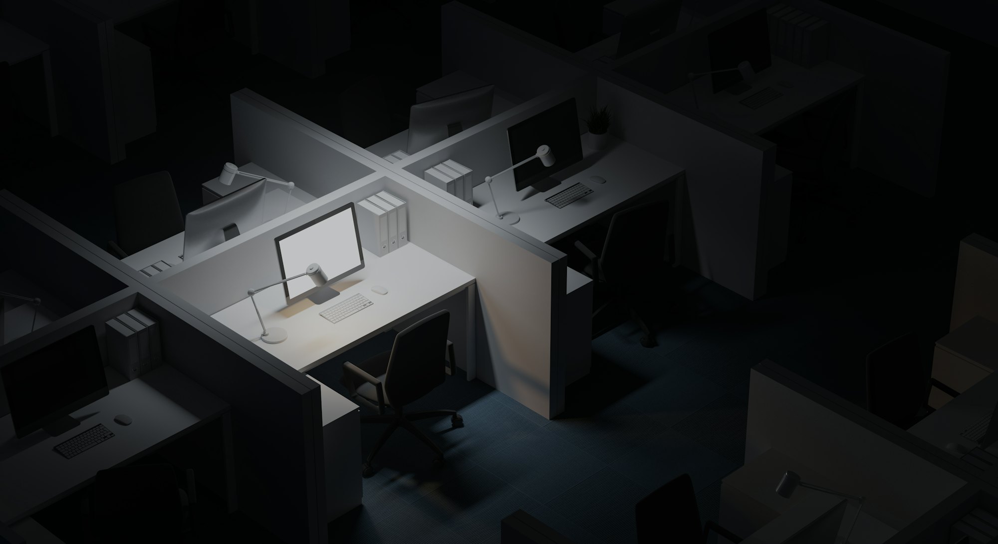 Top view of white office cubicle with mock up computer screen standing in modern office at night. Co...