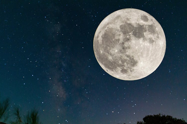 Full moon. Stars. super full moon. Full moon with the background full of stars in the galaxy. Horizo...
