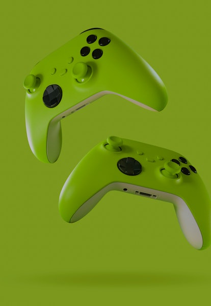 Green game controllers on green background