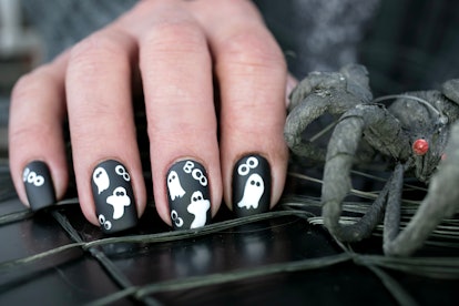 halloween 2022 nail trends include cute ghost nails 