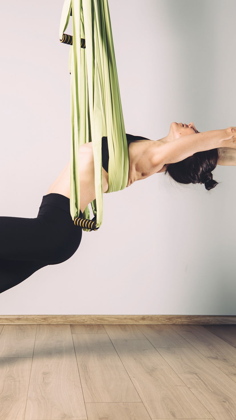 The benefits of aerial yoga.