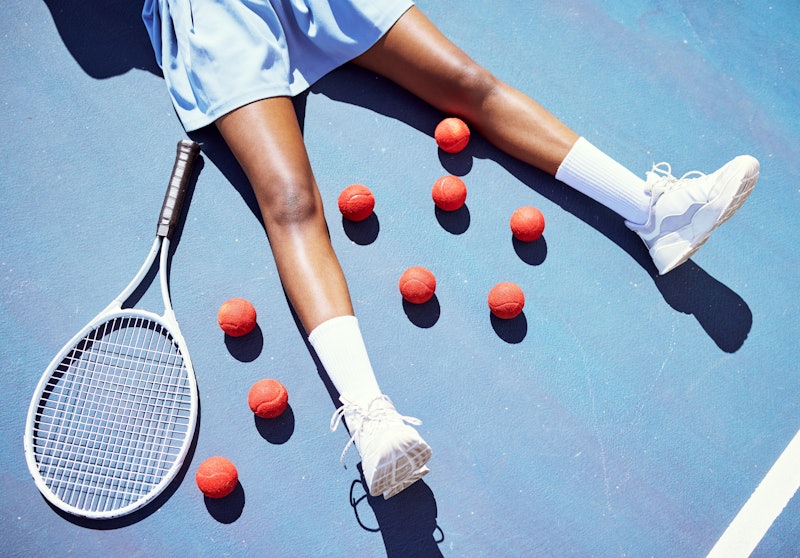 Tennis, tired and woman on a court for sports, fitness training and professional game for cardio. Ex...