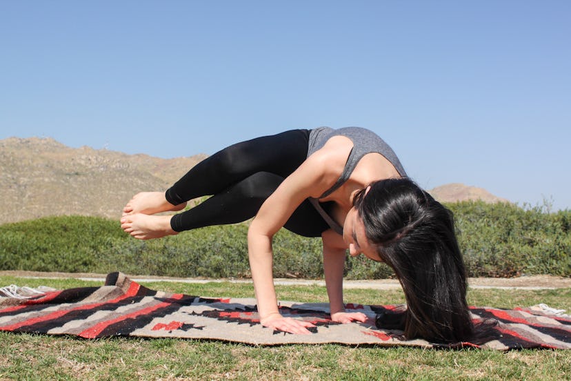 Side crow pose is a challenging posture.