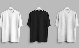 White, black, heather oversized t-shirt mockup, clothes hanging on wooden hanger, front view, isolat...