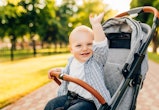 Portrait of smiling happy beautiful little child outdoors on summer day in an article about boy name...