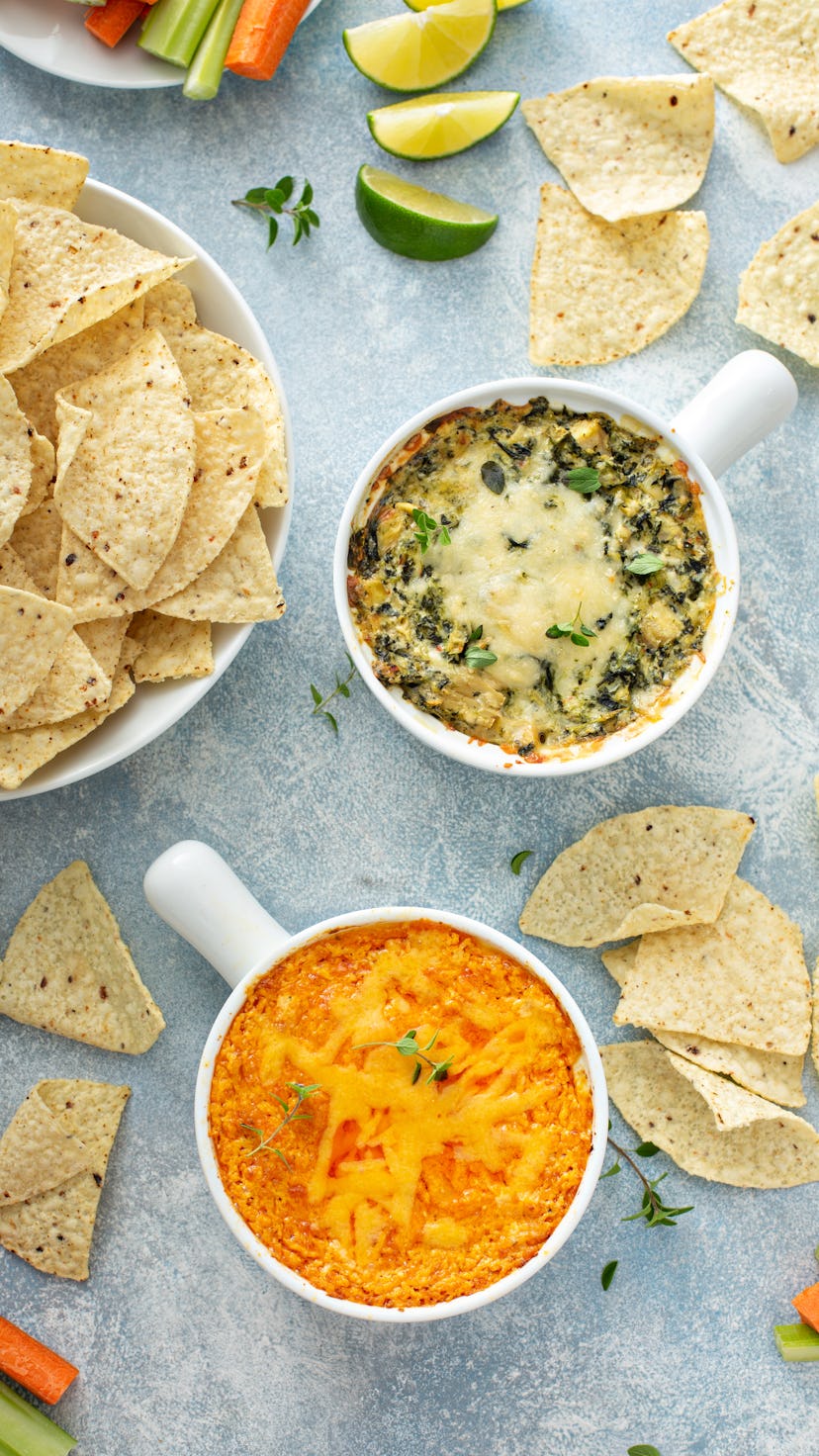 Artichoke spinach and buffalo chicken dips served with tortilla chips, appetizers