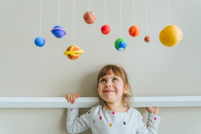 Solar system model hanging over the kid bed. There are lots of great celestial names for girls.