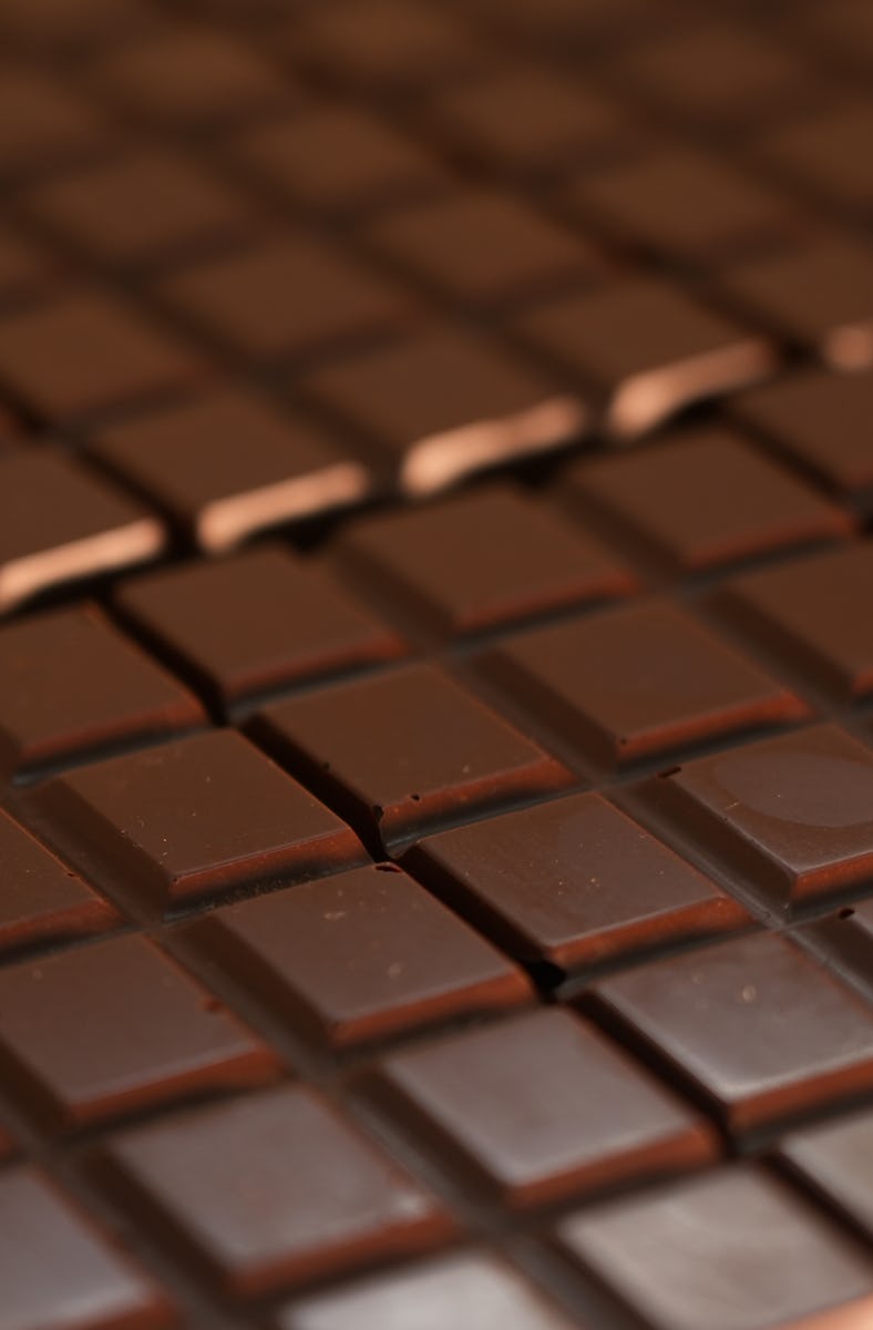 The manufacture of a chocolate bar from raw cocoa ingredients requires many steps, from grinding and...