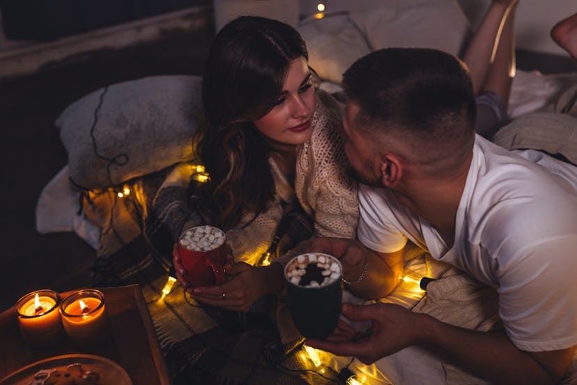 Movie nights at home are an easy and romantic buget-friendly date.
