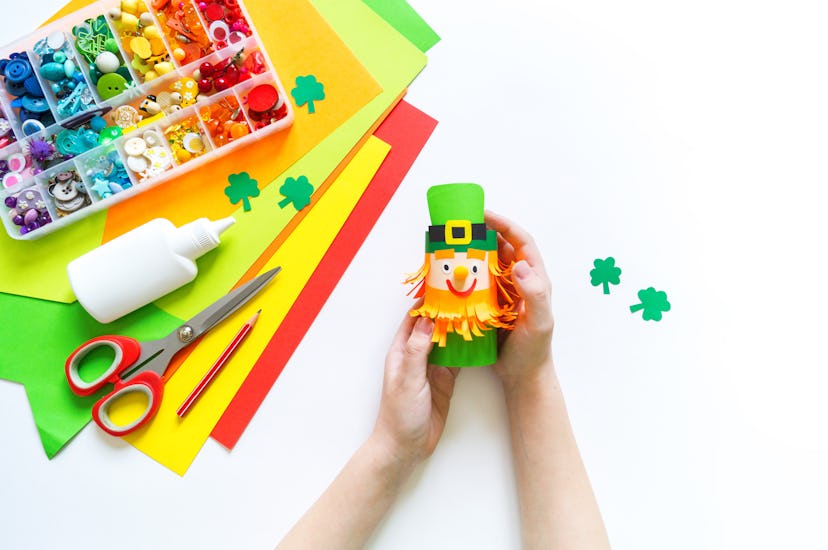 Leprechaun paper craft. St.Patrick 's Day. Four leaf clover green. Material for creativity. Children...