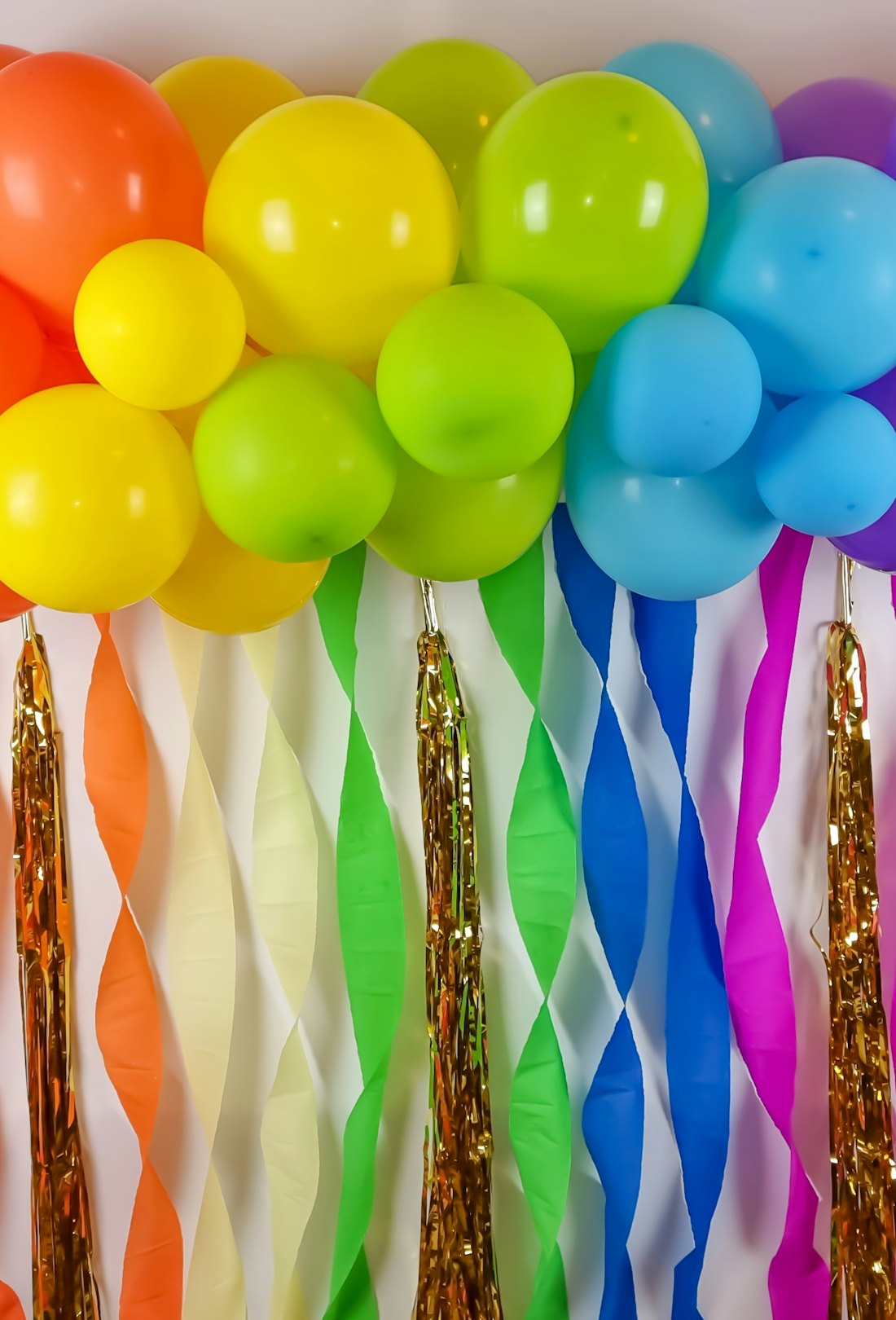 Birthday party decoration in rainbow colors. colorful backdrop balloon decor for parties and events