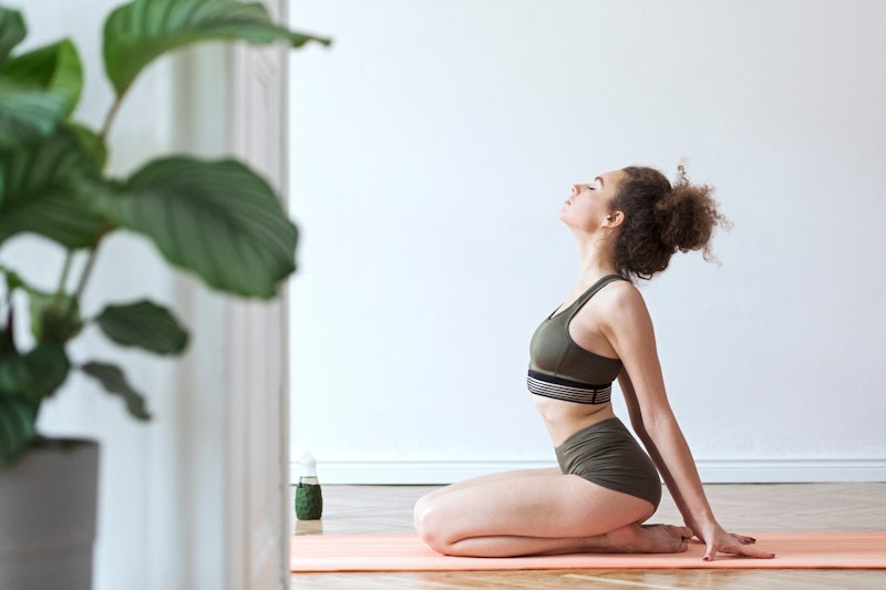 Wall Pilates is the low-impact fitness trend all over TikTok — here's how to do it.