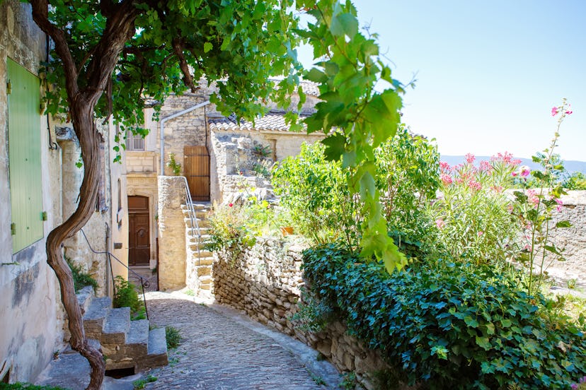 Old street of Gordes, a small typical town in Provence, France. 