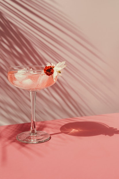 Summer cocktail with pink champagne 