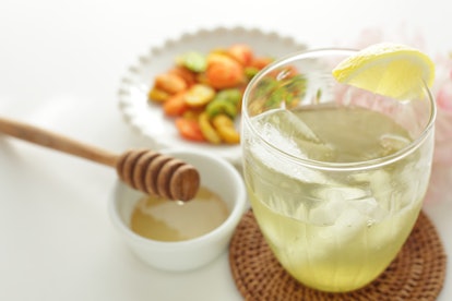 Japanese cocktail, green tea mixed with Shochu with lemon and honey 