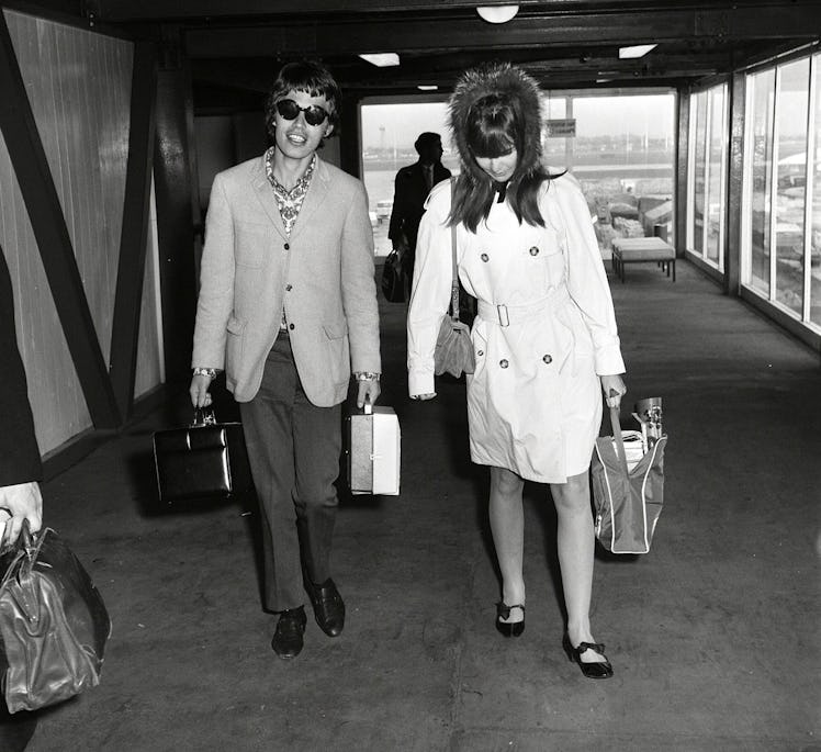 MICK JAGGER AND CHRISSIE SHRIMPTON ARRIVE BACK AT LONDON AIRPORT AFTER HOLIDAYING IN JAMAICA 24 DEC ...