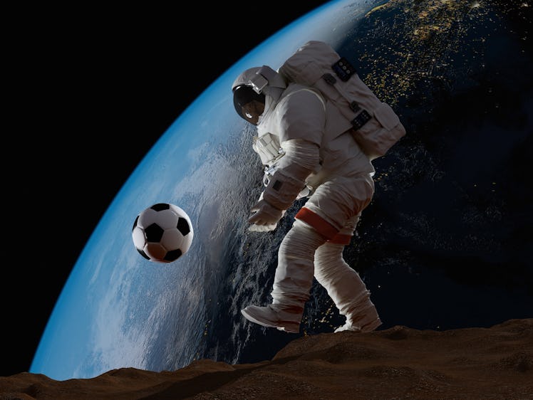 Astronaut with a ball on the background of the Earth., 3d render