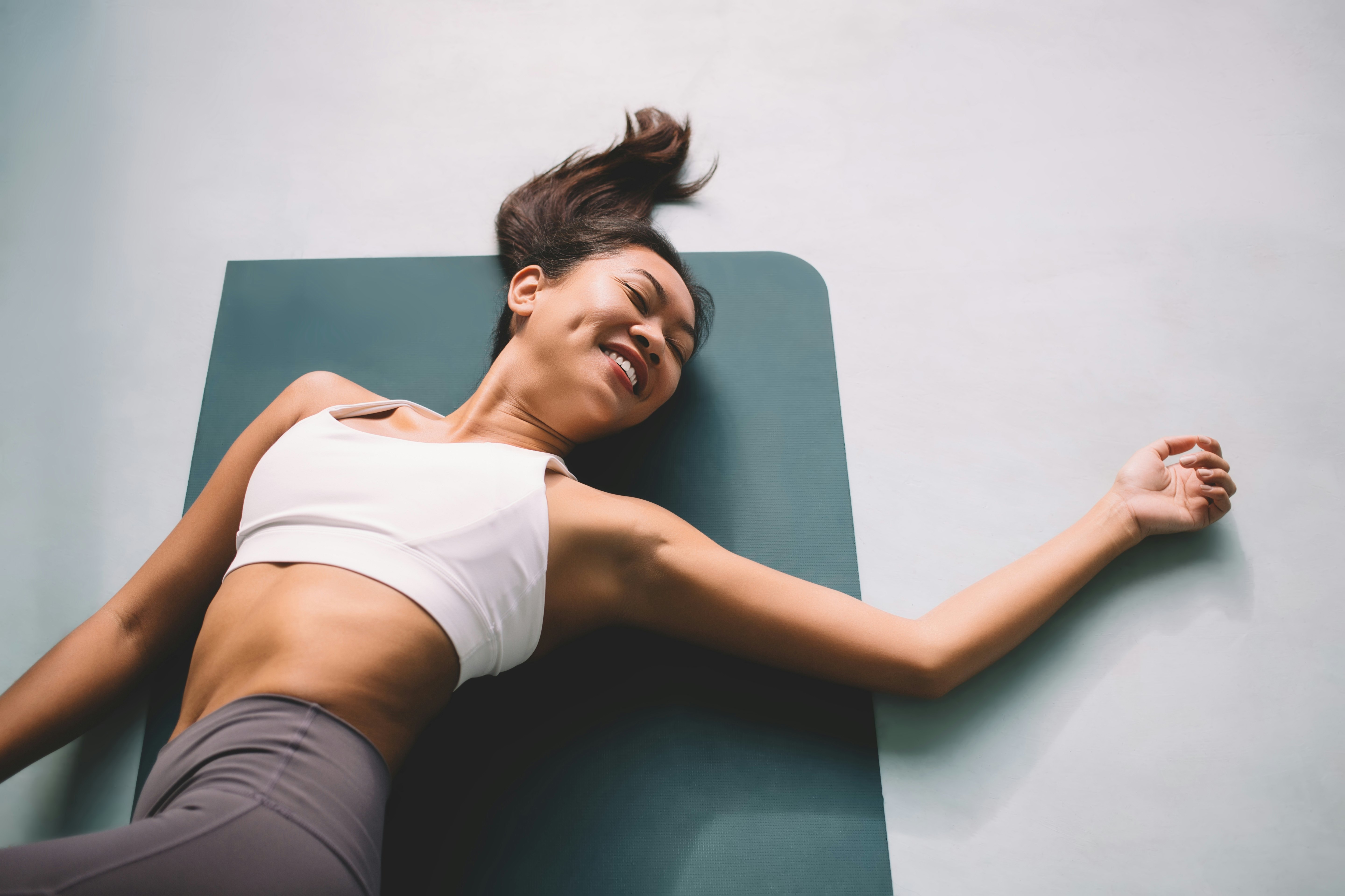 Top 3 Pilates Exercises You Can Do From Home, According to An