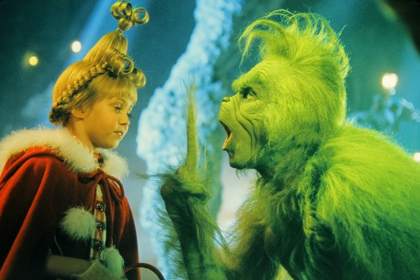 Jim Carrey, Taylor Momsen, “Dr. Seuss' How the Grinch Stole Christmas” (2000) Universal. Photo Credi…
