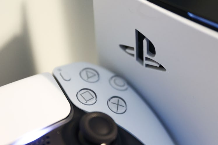PlayStation DualSense controller and PlayStation 5 console are seen in this illustration photo taken...