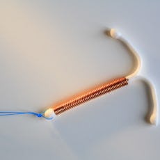 Contraceptive coin (intrauterine device IUD)