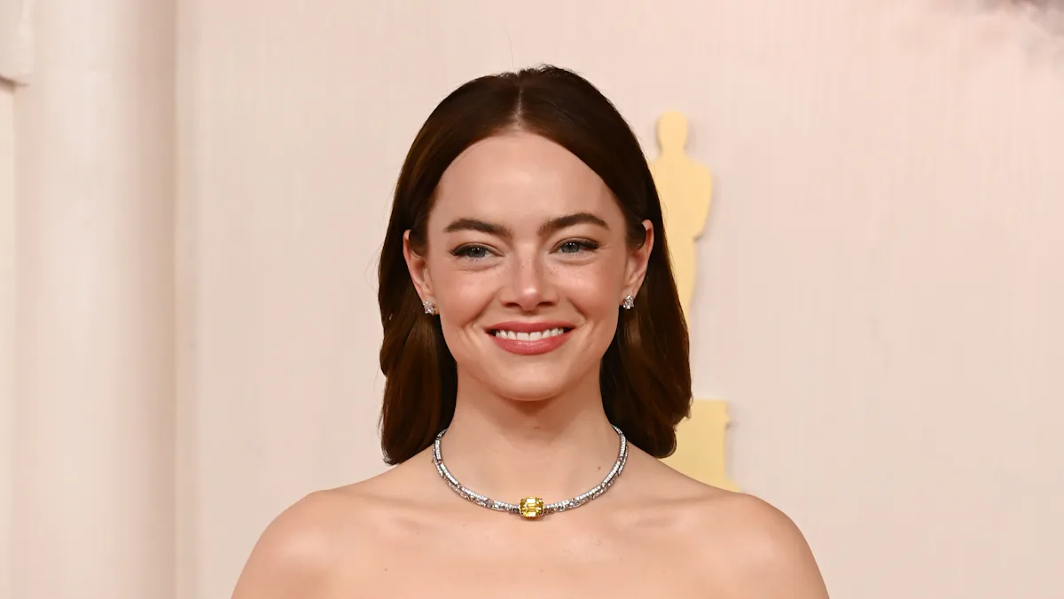 emma stone peplum dress Emma Stone Wears Strapless Louis Vuitton Gown at the 2024 Oscars