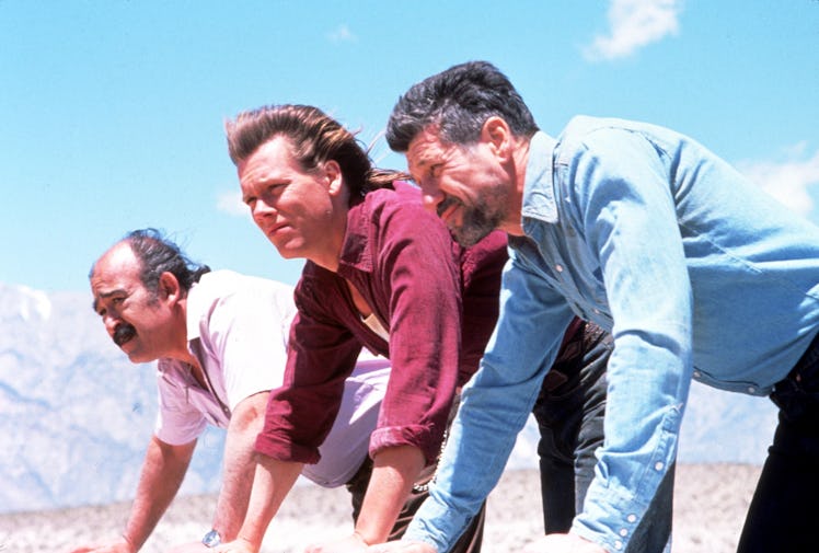 FILM STILLS OF 'TREMORS' WITH 1990, KEVIN BACON, DESERT, FRED WARD IN 1990