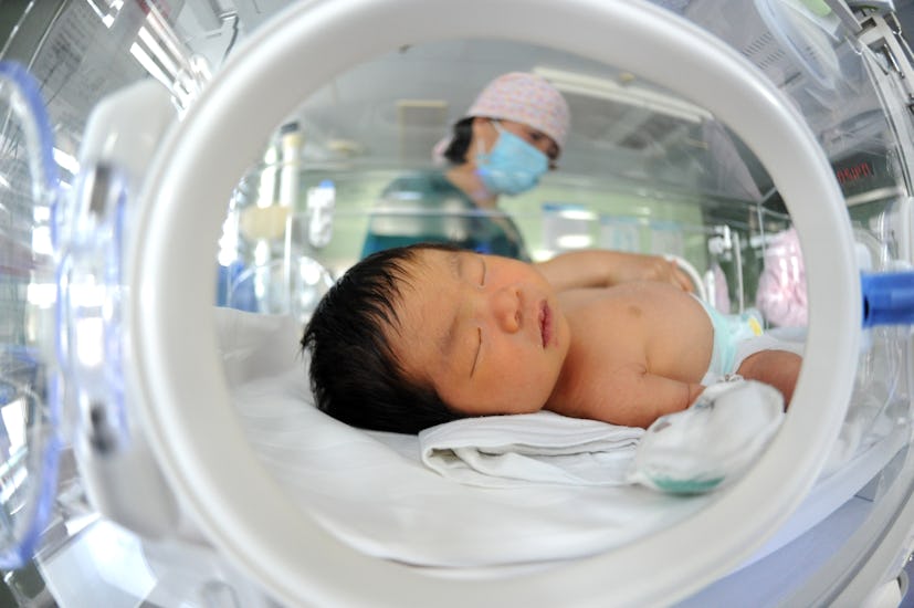 A medical worker is taking care of newborns at Dongfang Hospital in Lianyungang, China, on January 1...