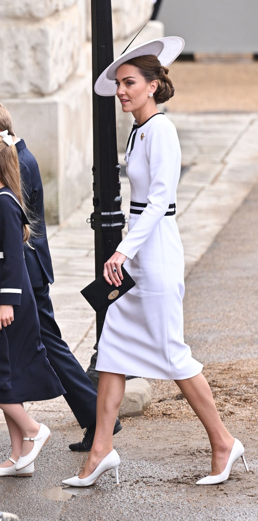 Catherine, Princess of Wales, wore a Jenny Packham white dress.