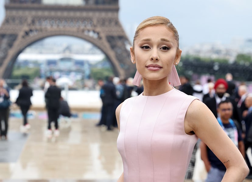 US singer Ariana Grande poses for a photo on the red carpet upon arrival for the Opening Ceremony of...