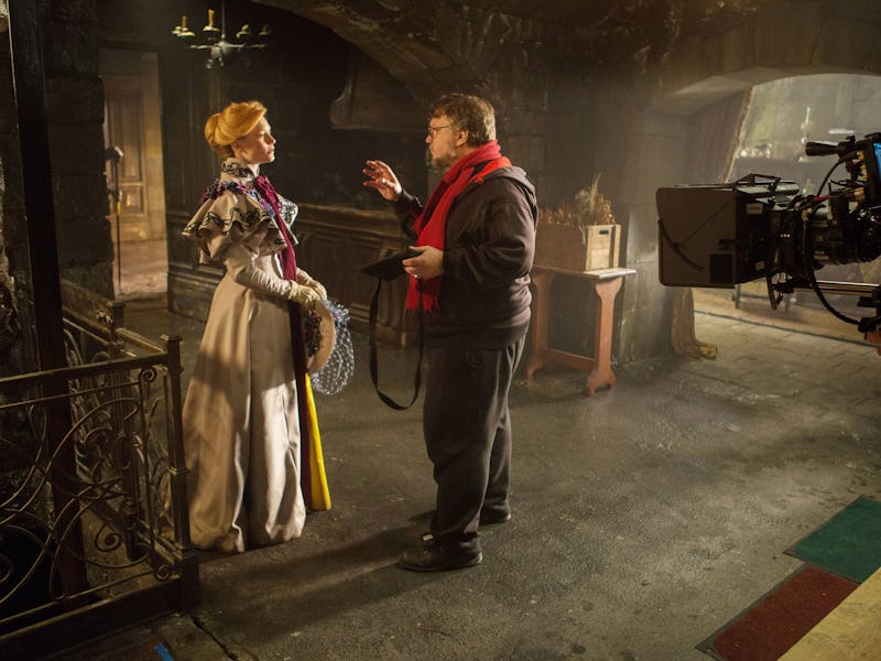 Mia Wasikowska, Guillermo Del Toro, on set