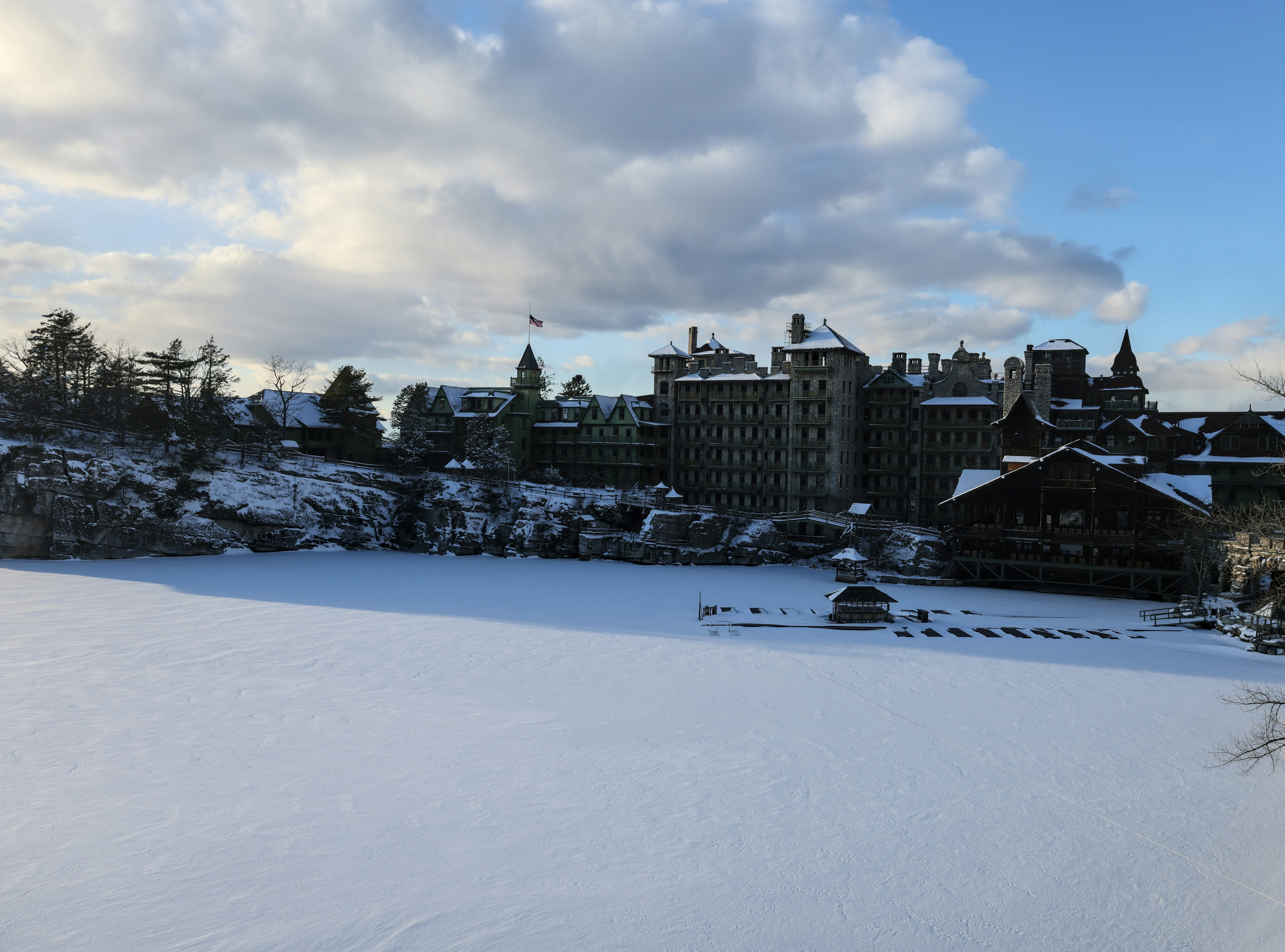 sunset view of famous hotel and wooden gazebo along hiking trail in upstate new york near new paltz ...