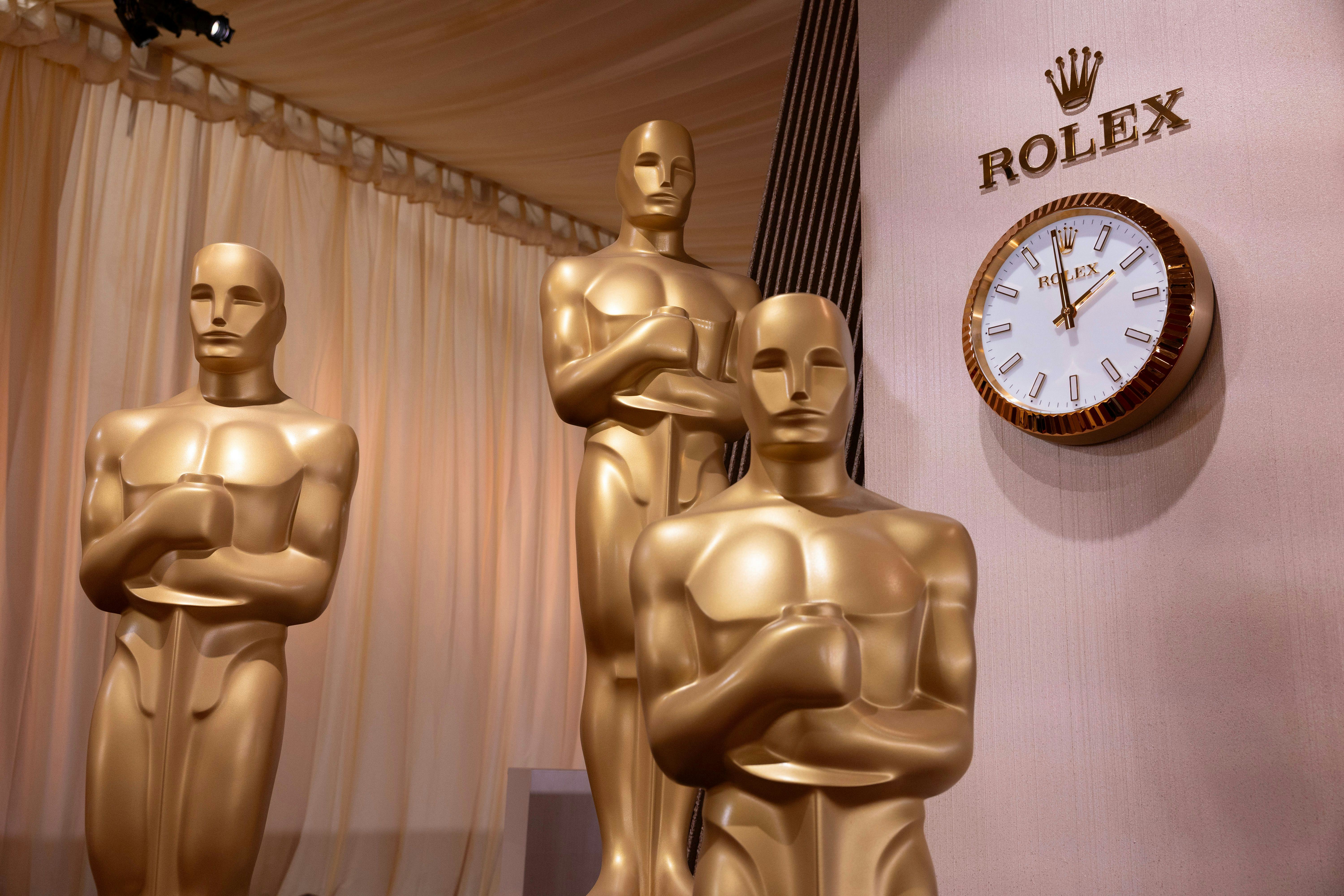 Oscar statues on the red carpet during preparations for the 97th annual Academy Awards ceremony at t...