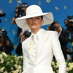 Zendaya wearing a bridal white suit at the 2025 Met Gala.